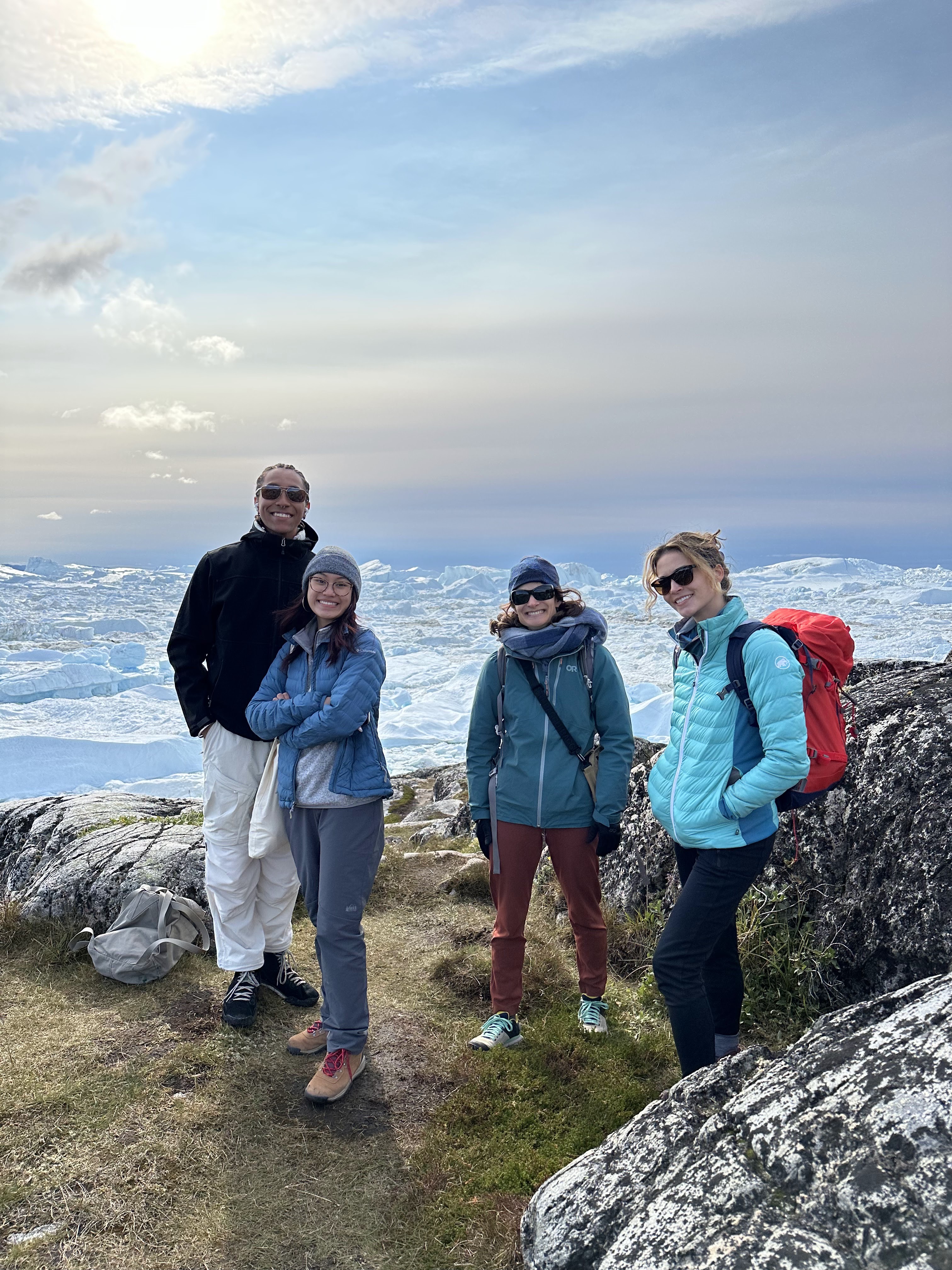 Michalea and study abroad Program Lead Michelle Koutnik pose with students along the Ilulissat icefjord in Greenland,...