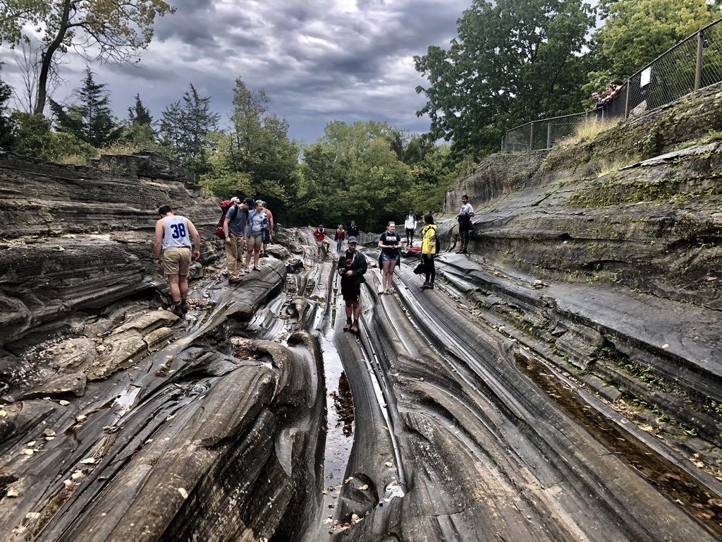 Students explore extensive glacial grooves from the Last Glacial Maximum on Kelley's Island, Lake Erie. 2019.